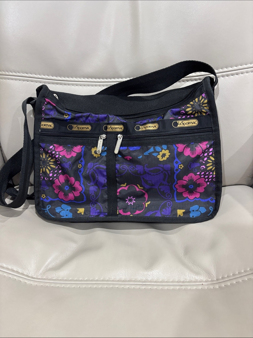 Lesportsac Black Crossbody Bag with Purple, Pink & Blue Floral Print